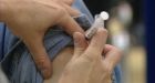 GlaxoSmithKline, flu vaccine maker, gets warning from U.S. FDA