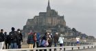 Supertide swallows Mont Saint-Michel's causeway in France